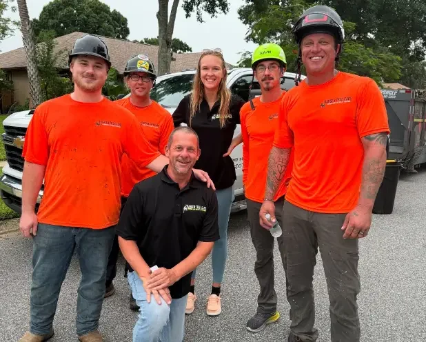 The Ranger Tree Care team together in company work shirts